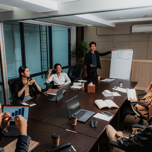 TechGadgets Case Study - Business meeting with team members collaborating
